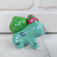
              Pokemon Bulbasaur Figure - Christmas Hat - Wicked Cool Toys
            