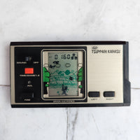 
              Bandai Naughty Crow Handheld LCD Game & Watch Tsuppari Karasu 1981
            