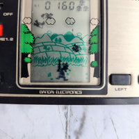 
              Bandai Naughty Crow Handheld LCD Game & Watch Tsuppari Karasu 1981
            