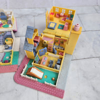 
              Polly Pocket Pollyville Bundle Cozy Cottage + School House (Light Up)
            