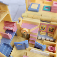 
              Polly Pocket Pollyville Bundle Cozy Cottage + School House (Light Up)
            