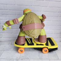 
              TMNT Skateboarding Mikey RC Michelangelo + Remote Control Ninja Turtles JAKKS
            