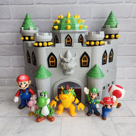 Super Mario Deluxe Bowser’s Castle Playset with Figures Bundle