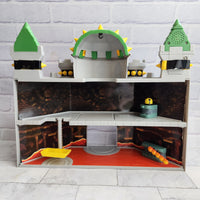 
              Super Mario Deluxe Bowser’s Castle Playset with Figures Bundle
            