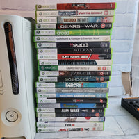 
              Xbox 360 Console Bundle + 47 Games + 2 Controllers - Ready To Play!
            