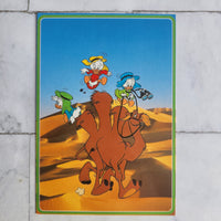 
              Duck Tales Camel Ride (Around The World) Framed Vintage Disney Postcard
            