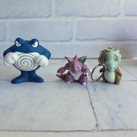 
              Pokémon Figure Bundle Poliwrath Nidoking Cubone Pokeball Vintage Tomy 1998
            