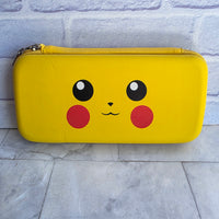 
              Pokémon Pikachu Nintendo Switch Carry Case Bundle   Pikachu themed Nintendo Switch Carry Case with 4x Pikachu Thumbgrips.  Also includes brand new screen protector.
            