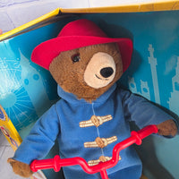 
              Cycling Paddington Bear On Musical Pedal Bike - New In Box
            