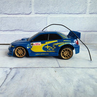 
              Subaru Impreza Remote Control Car Mega Motors Vintage 2002 In Box
            