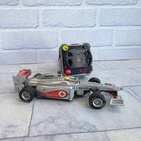
              Burago Formula 1 Mclaren RC Wrist Racer Remote Control Jenson Button
            