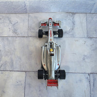 
              Burago Formula 1 Mclaren RC Wrist Racer Remote Control Jenson Button
            