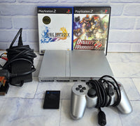 
              Silver Slim PS2 Console Bundle + Controller + Cables + Memory Card + 2 Games
            