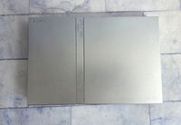 
              Silver Slim PS2 Console Bundle + Controller + Cables + Memory Card + 2 Games
            
