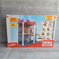 
              Fortnite Bundle Squad vs Squad Playset + Figures Weapons + Golf Cart
            