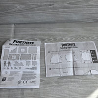 
              Fortnite Bundle Squad vs Squad Playset + Figures Weapons + Golf Cart
            