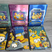 
              The Simpsons DVD Boxset Bundle Seasons 1-11 - Complete With Inserts + Slipcovers
            